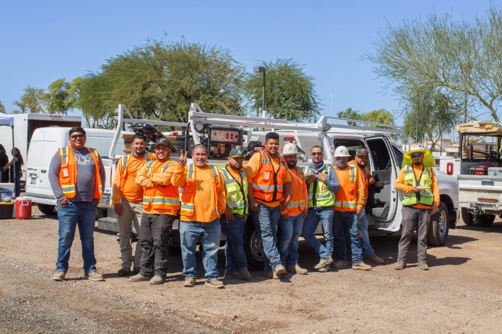 Construction workers smiling at camera