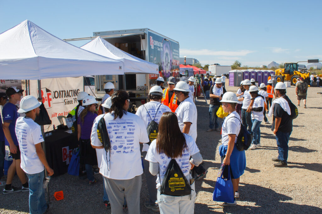 Teenagers standing at a career fair