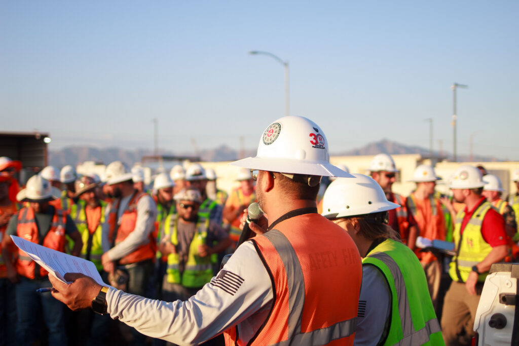 construction workers at a meeting