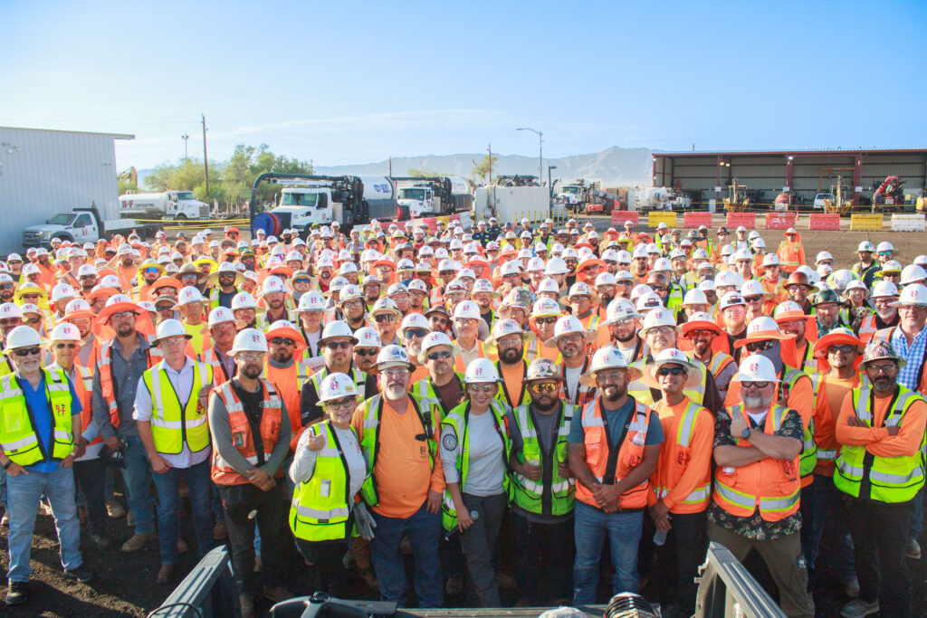 group of construction workers smiling